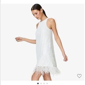 Adrianna Papell | HAND-SEQUINED TRAPEZE HALTER DRESS WITH FEATHER TRIM IN IVORY
